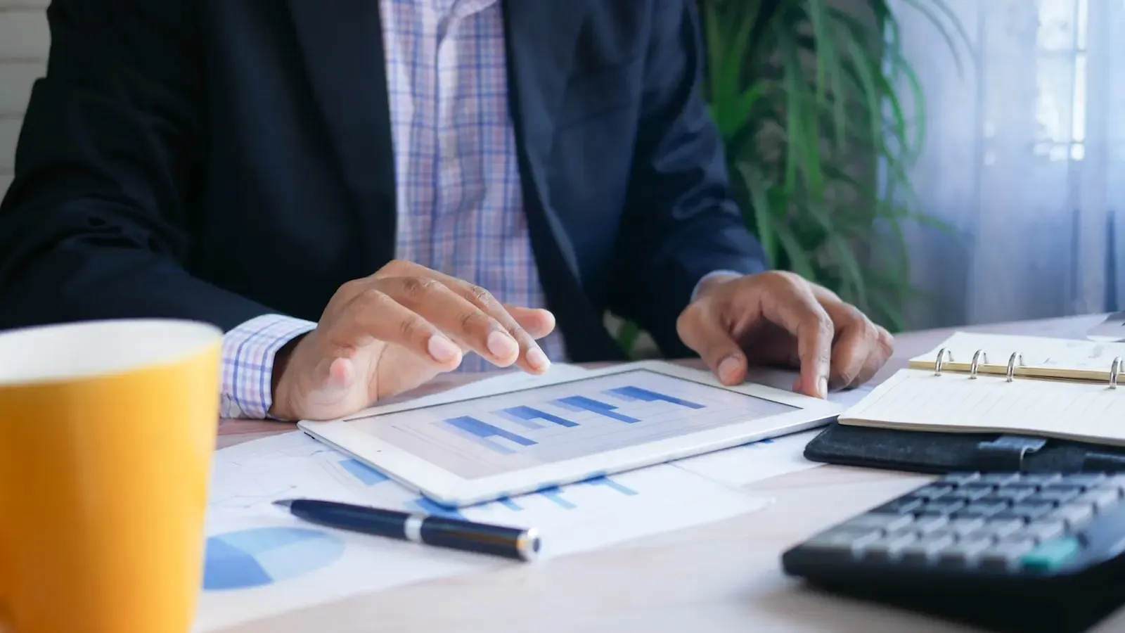 How can small business owners calculate ROI to identify unprofitable initiatives