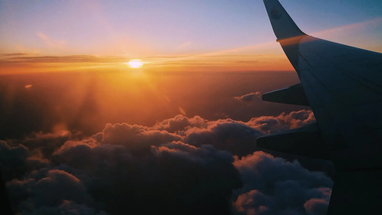 How can you avoid jet lag when traveling to a distant time zone?