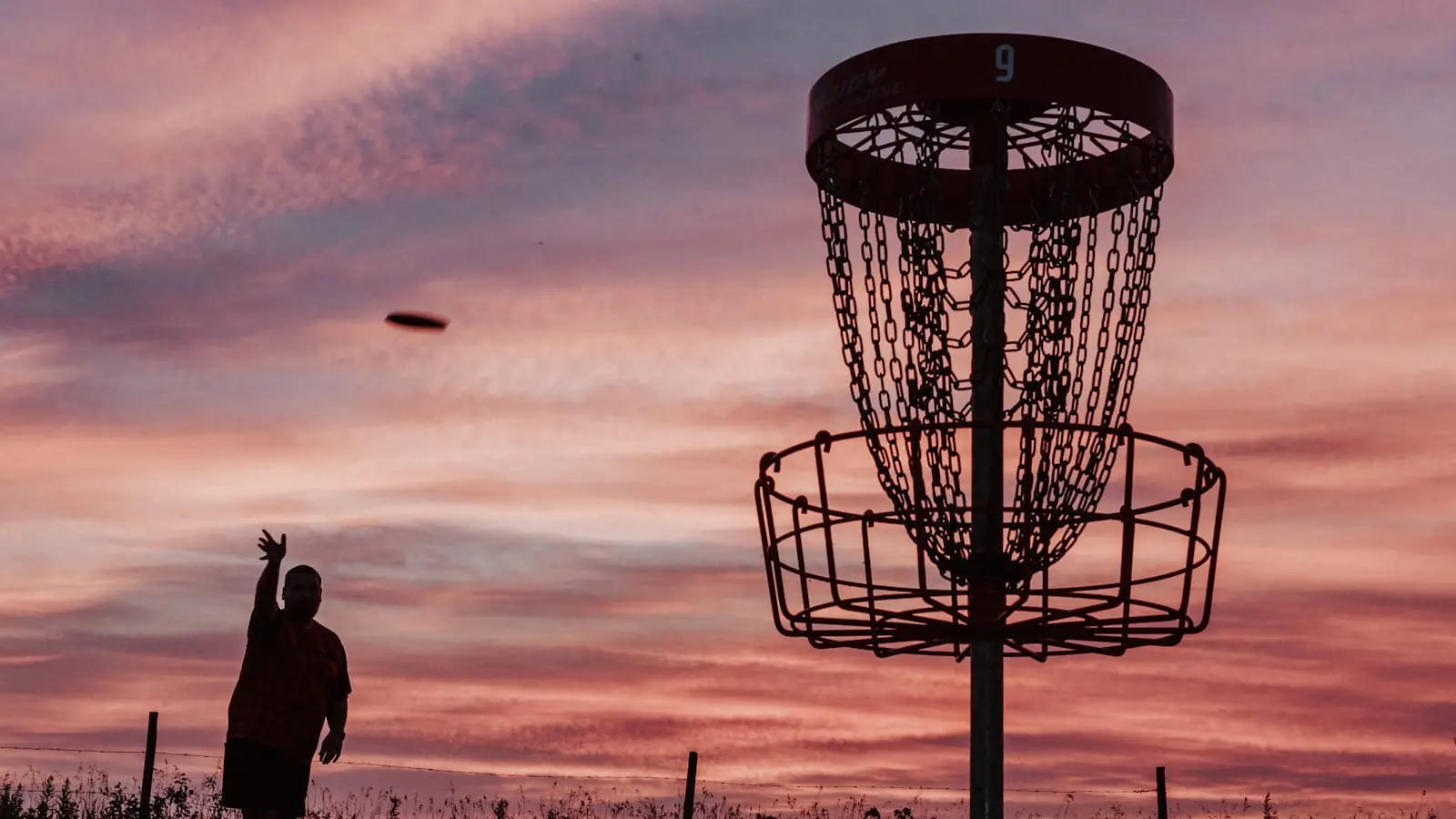 How Can Beginners Build Disc Golf Backhand Distance Without Overthrowing?