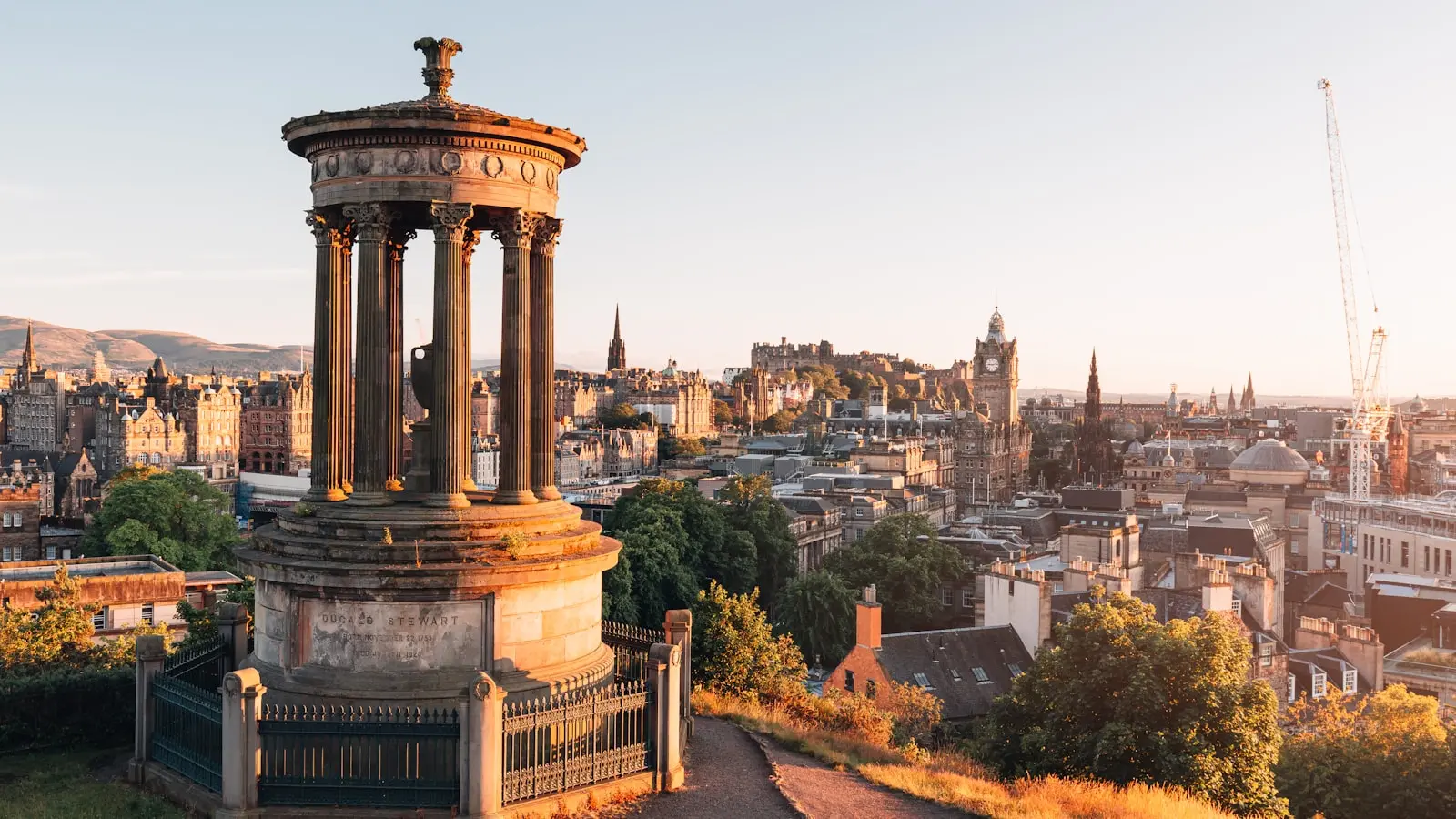 How can you explore Scotland on a budget while staying in Edinburgh?