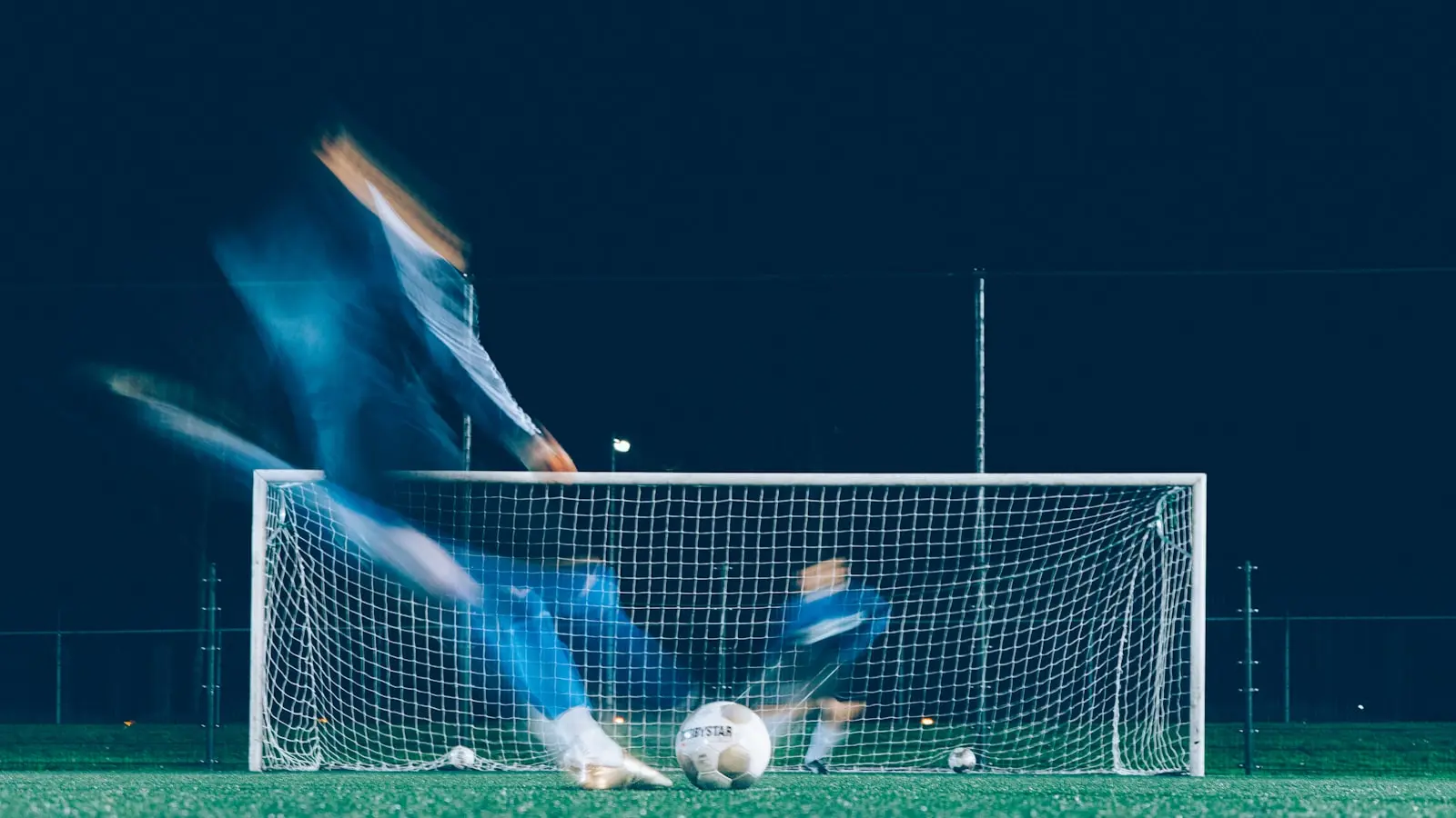 Why Do Soccer Teams Play Out From the Back Under Pressure?