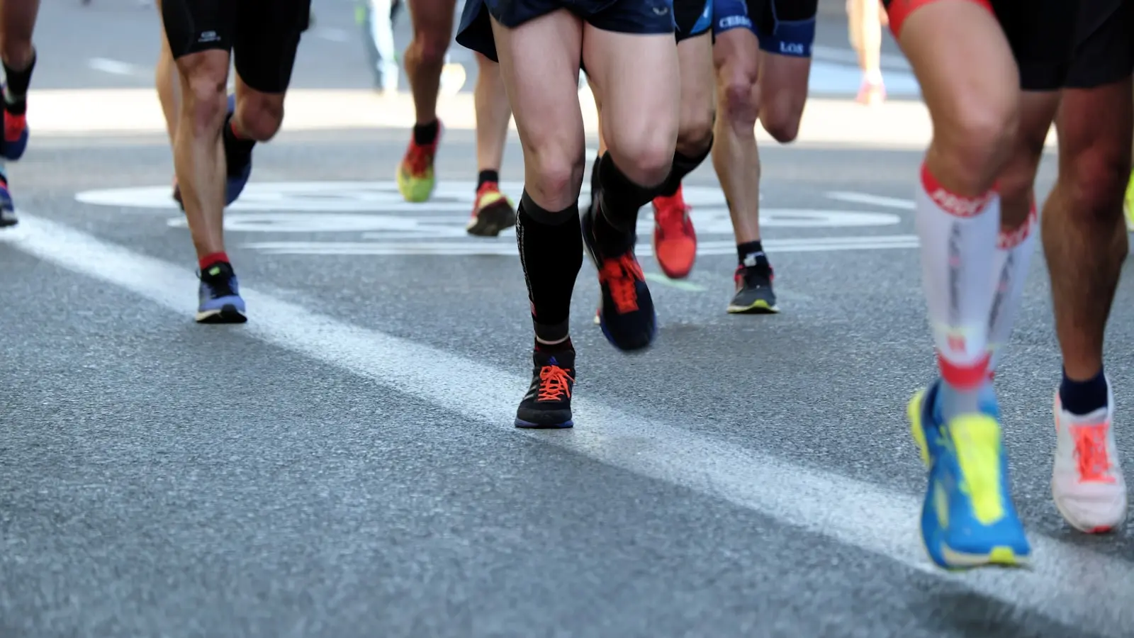Why Do Elite Runners Slow Down After a Fast Start?