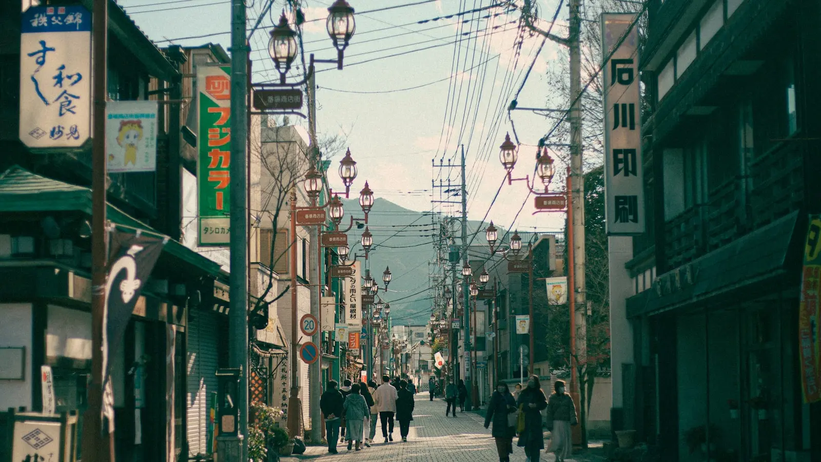 Why do megacities feel less scenic than smaller Japanese towns?